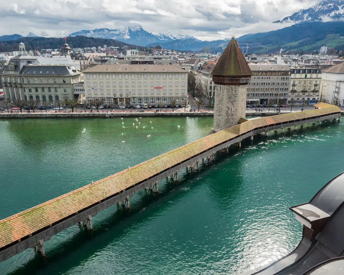Chapel Bridge crossing the Reuss River beside Lucerne Old Town