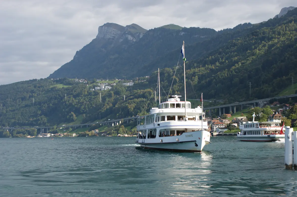 SGV Cityboat on Lake Lucerne during a clearing window after rain.