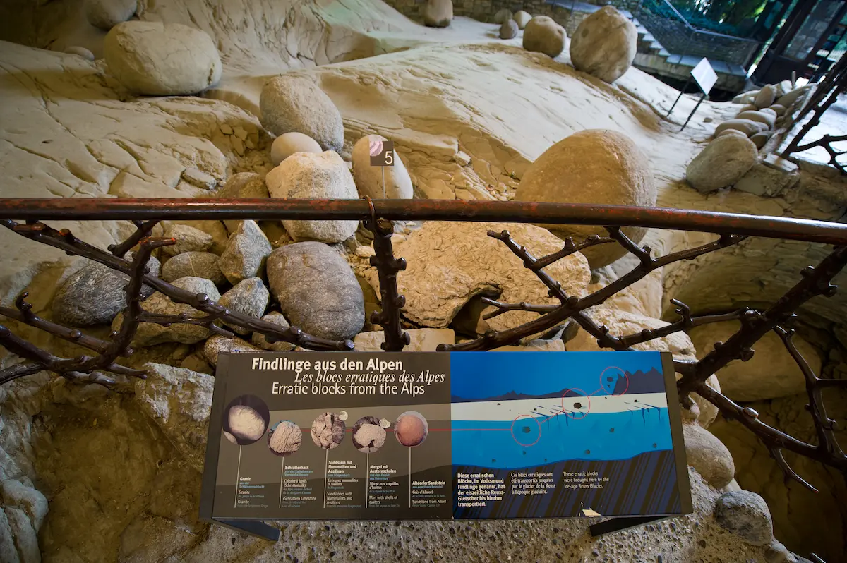 Rock formations and the visitor route inside the Glacier Garden in Lucerne.