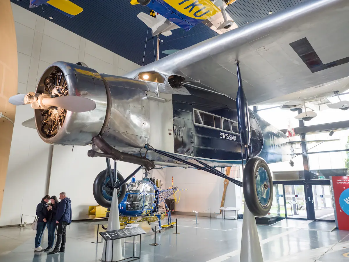Aircraft exhibition hall at the Swiss Museum of Transport during a rainy-day itinerary in Lucerne.