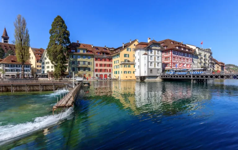 Reuss river in Lucerne with the Old Town buildings behind it — where to stay in Lucerne