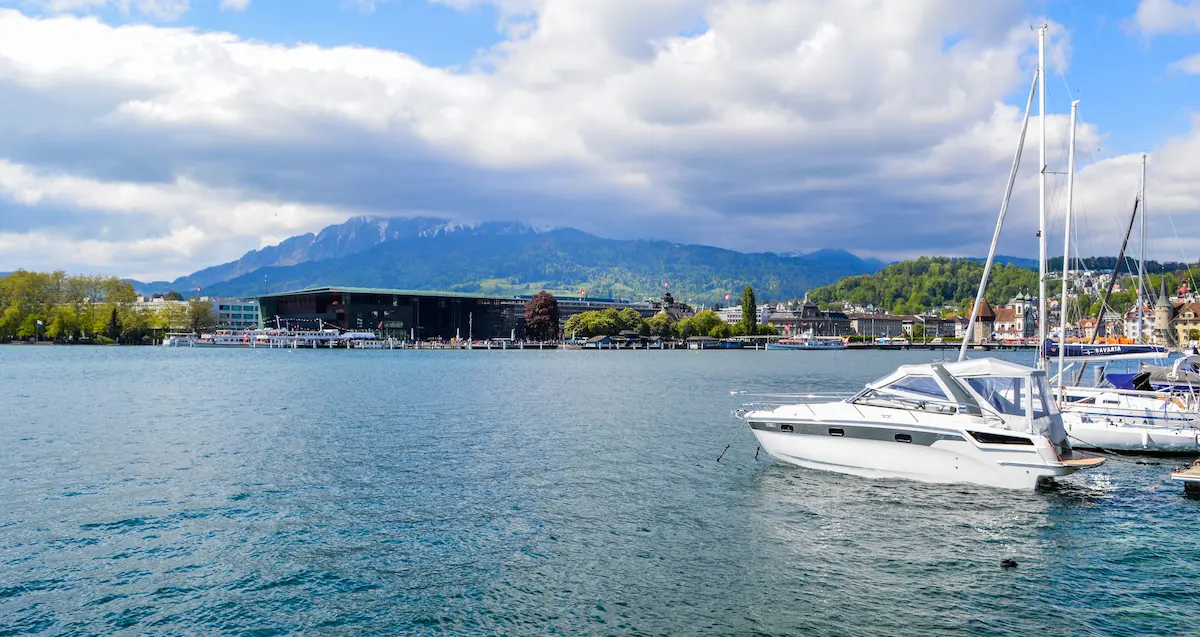 Boats moored along the quay by the KKL next to Luzern train station