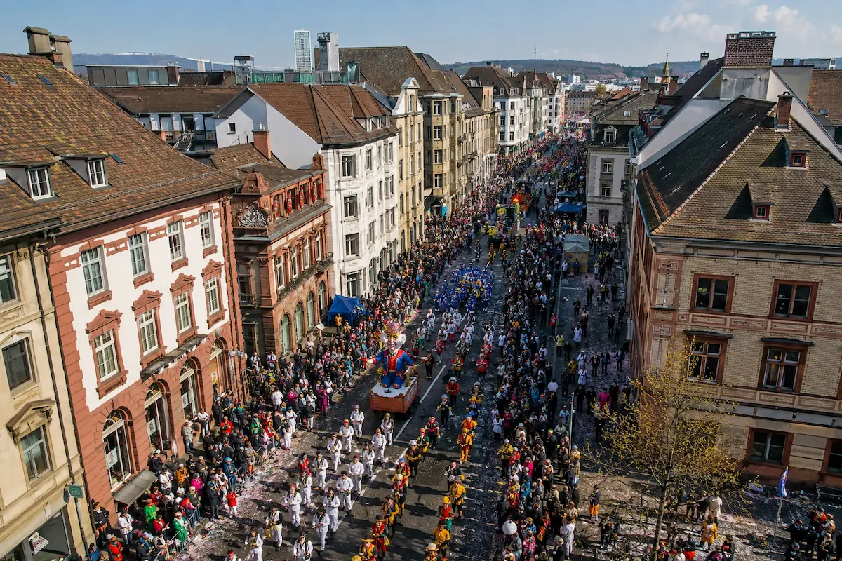 AI-generated high-angle daytime view of a carnival procession moving through central Basel.