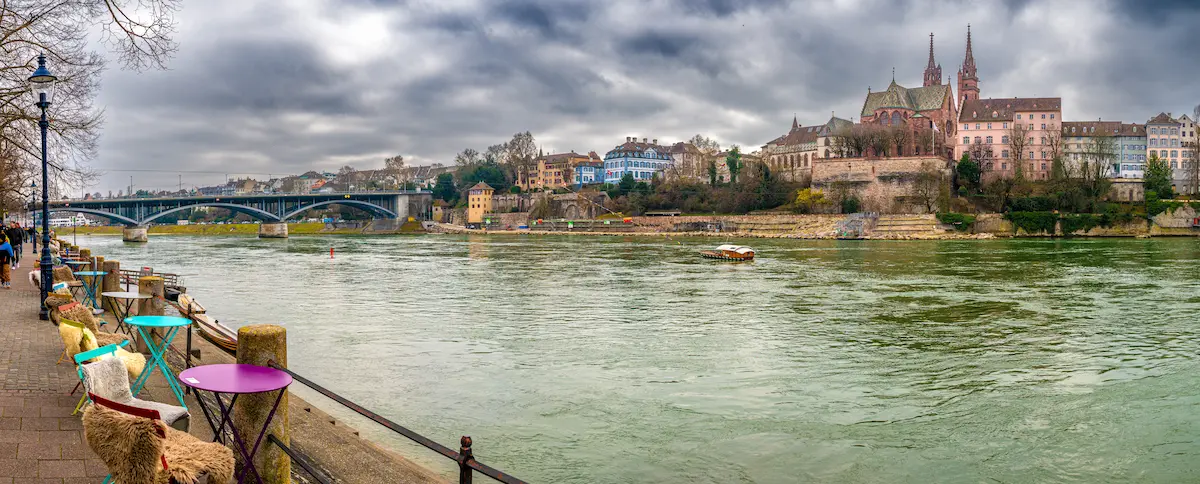 Kleinbasel Rhine promenade with Basel Minster across the river