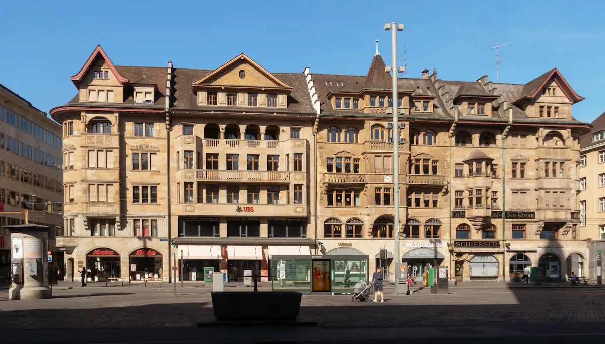 Marktplatz in Basel Old Town with the red Town Hall and tram tracks