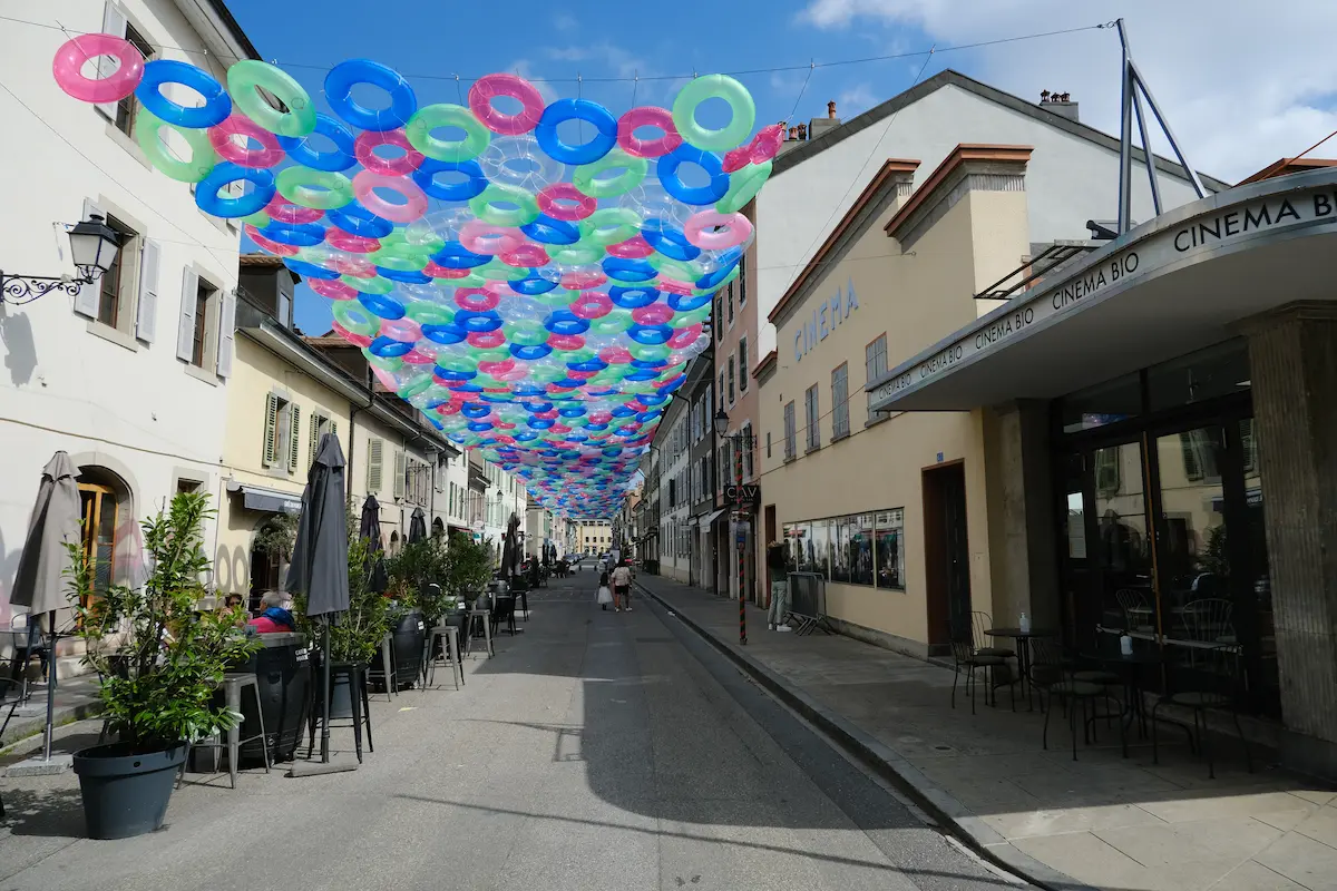 Rue Saint-Joseph in Carouge with cafés and low-rise neighborhood buildings