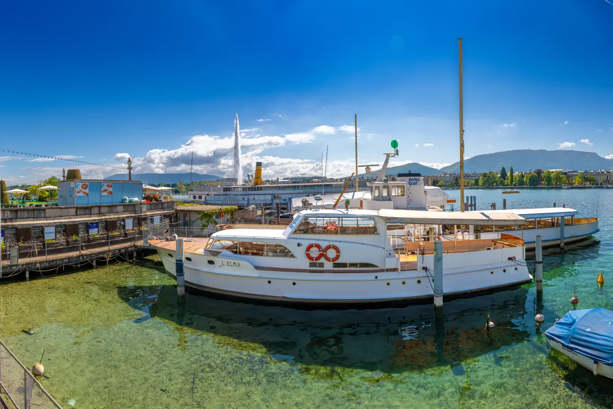 Boats and the Geneva waterfront seen from Quai du Mont-Blanc