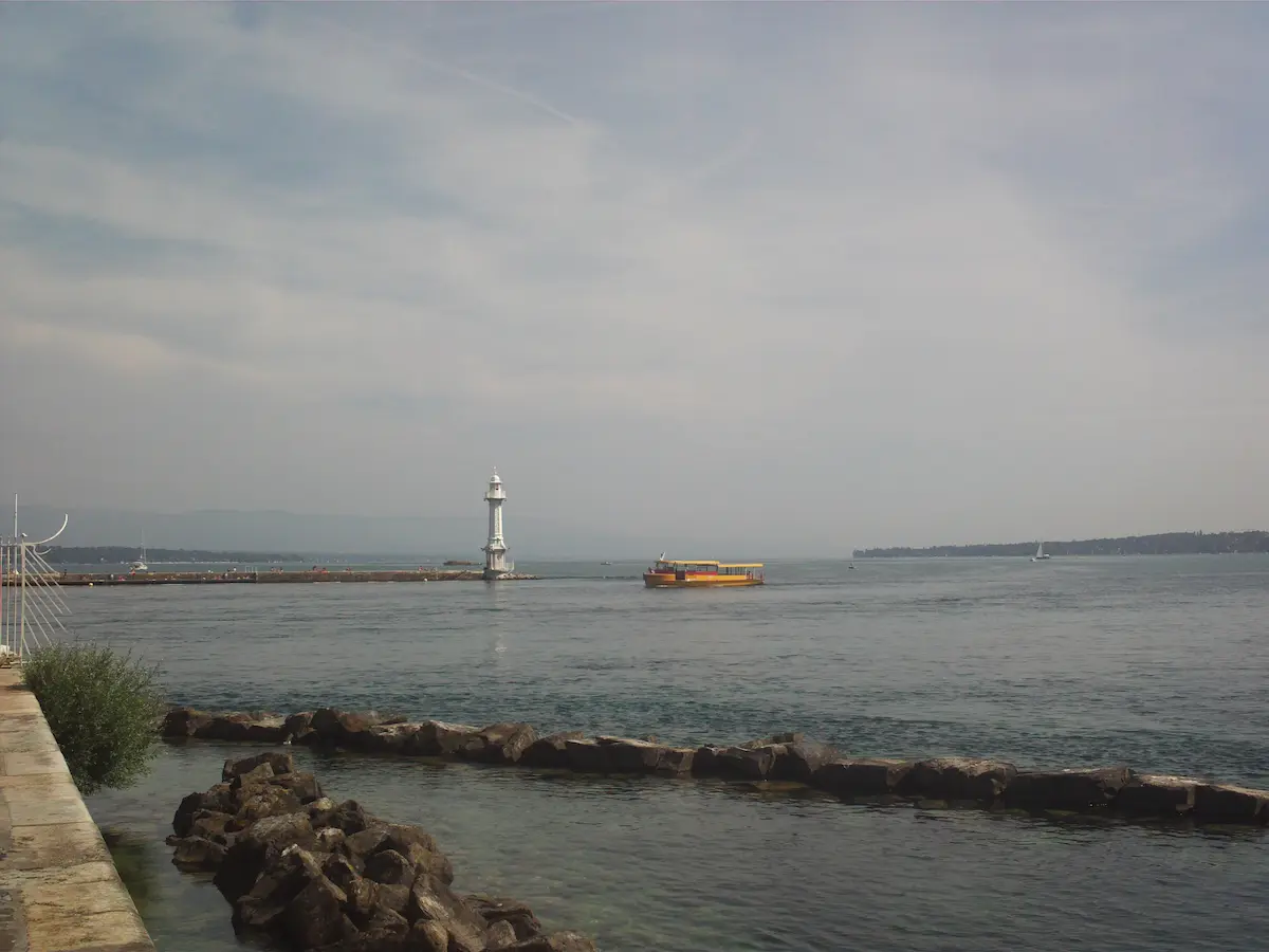 Yellow Mouette shuttle boat crossing Lake Geneva