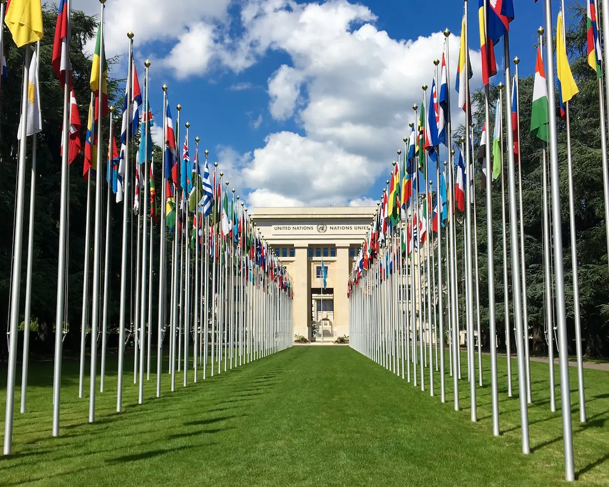 Flags leading toward the Palais des Nations in Geneva