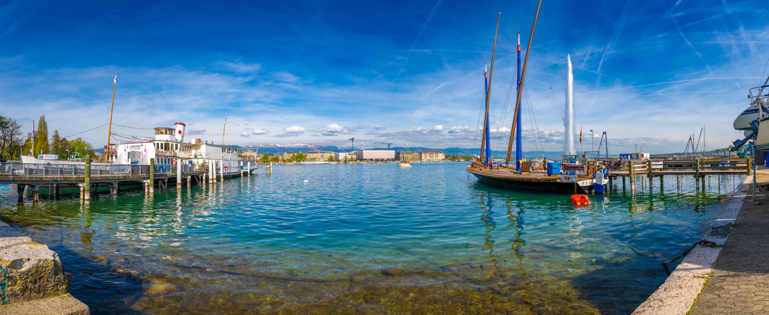 Wide view of central Geneva and the lakefront in April 2026