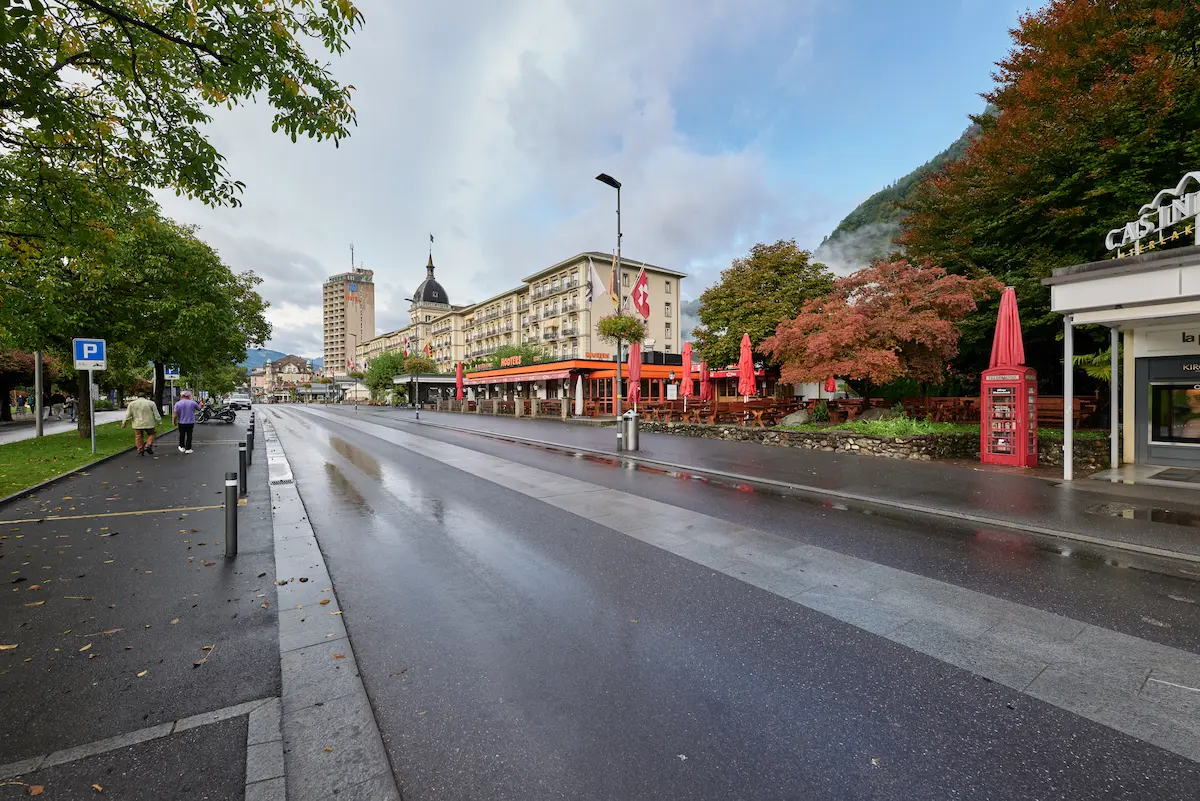 Höheweg street in central Interlaken with hotels and mountain slopes behind