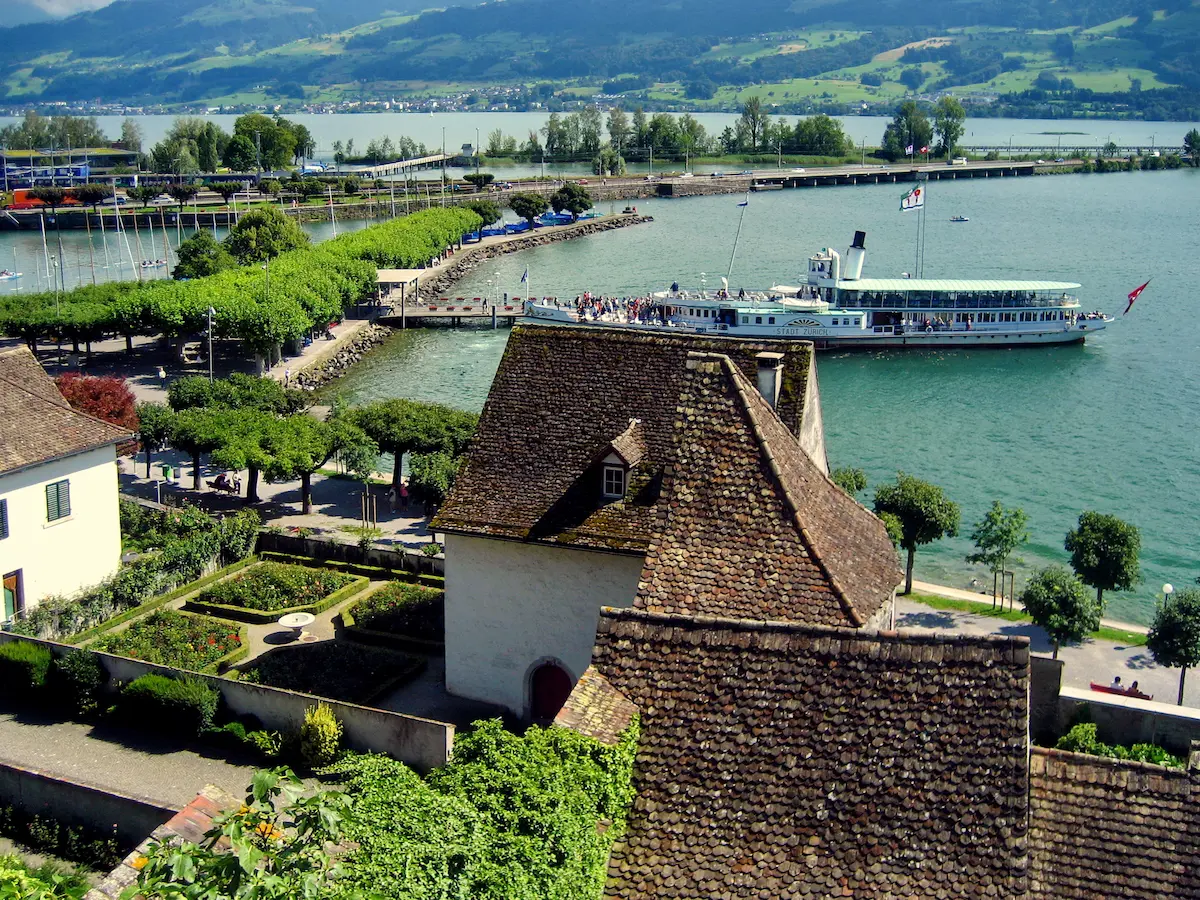 ZSG paddle steamer arriving at Rapperswil harbor on Lake Zurich