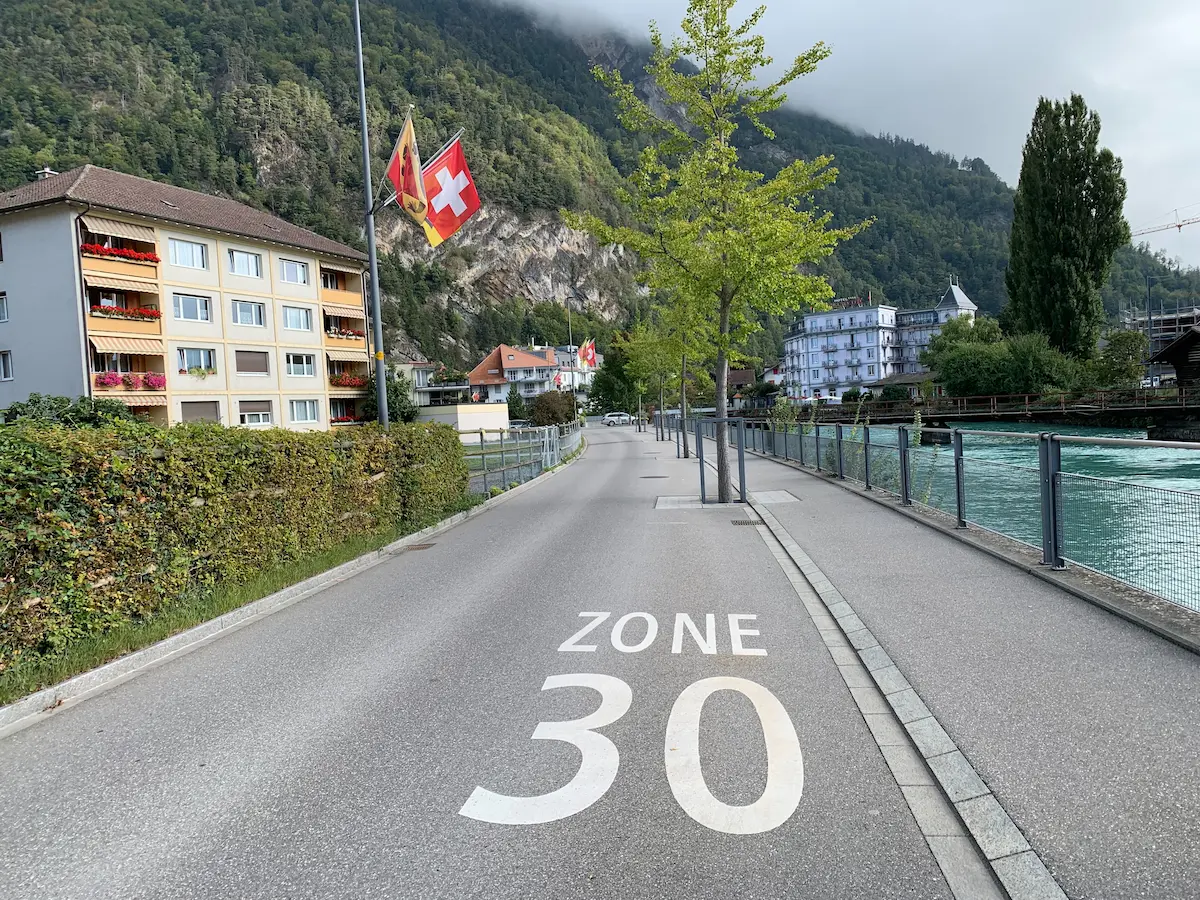 Where to stay in Interlaken: Aarestrasse in Unterseen beside the Aare River and residential buildings