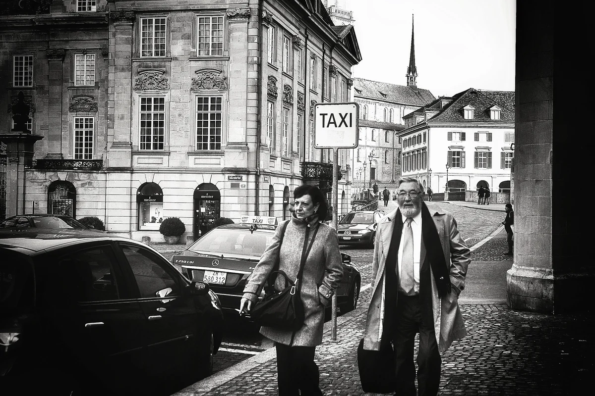 Taxi sign and taxis in Zurich illustrating the airport taxi option