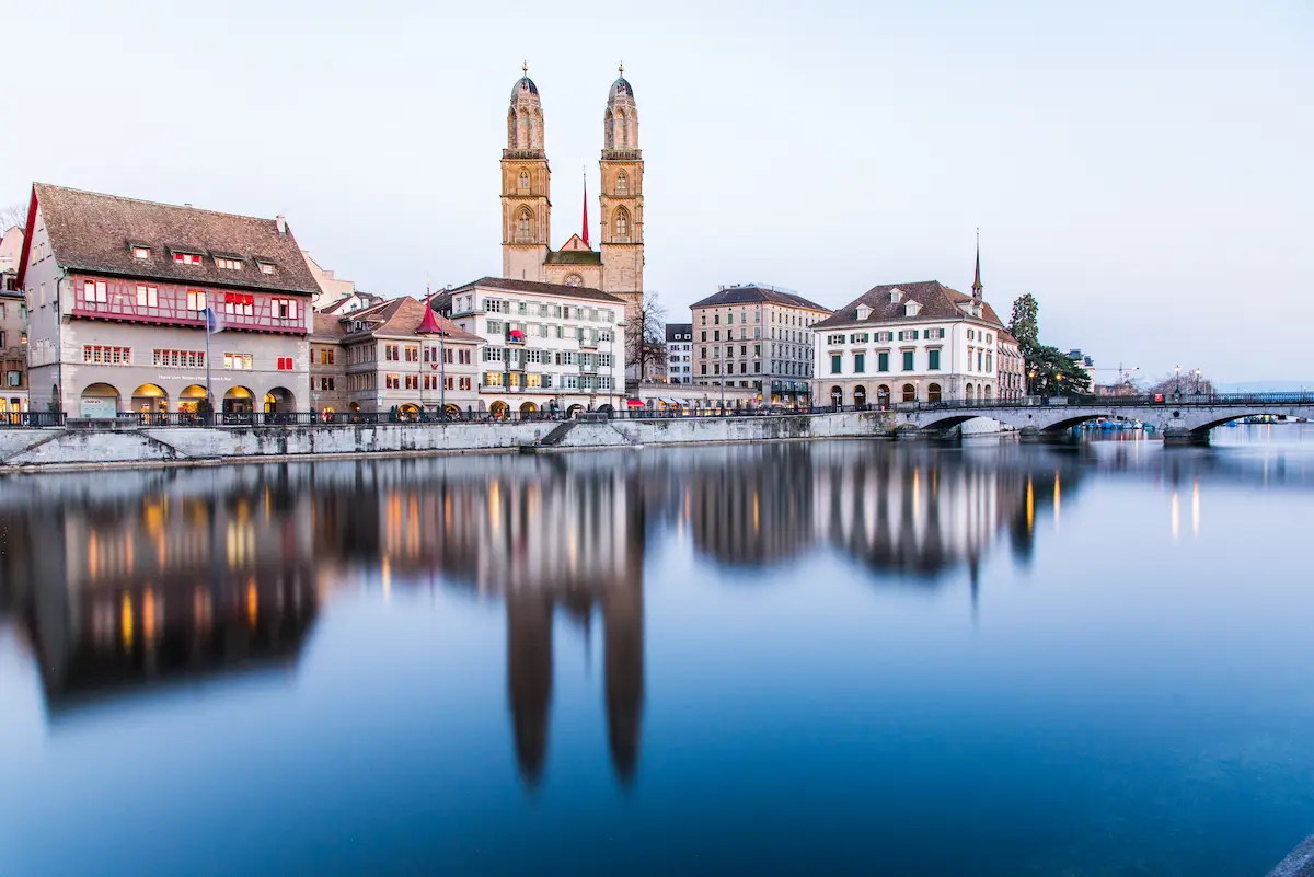 Zurich Old Town and Grossmünster reflected in the Limmat River