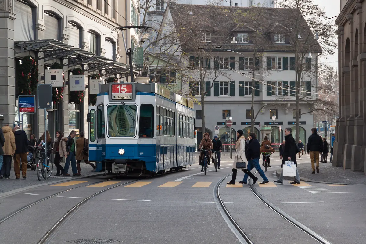 Zurich tram on Limmatquai during a Monday city itinerary