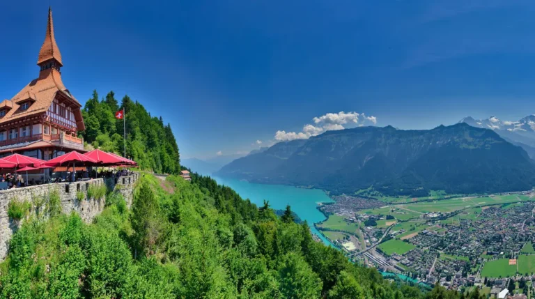 Panoramic view over Interlaken from Harder Kulm with the town, lake and surrounding mountains